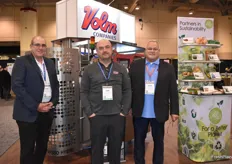 Mark Zachanowich, John Moretto, and Kevin Fischer with Volm Companies in front of a vertical paper bagger. 